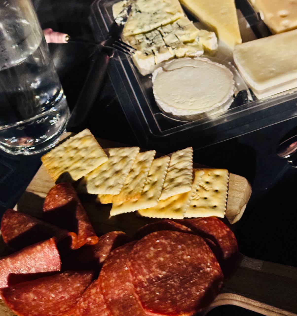 Cheese and charcuterie board with crackers